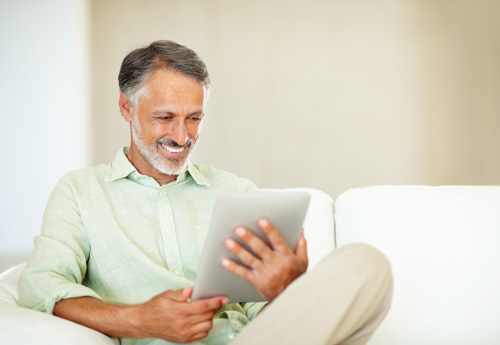 Man reading on ipad