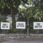 Signs-on-fence
