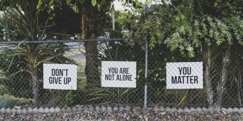 Signs-on-fence